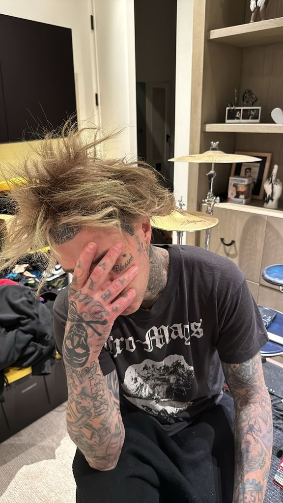 Travis Barker captured in a rare personal moment at home, shared on Instagram