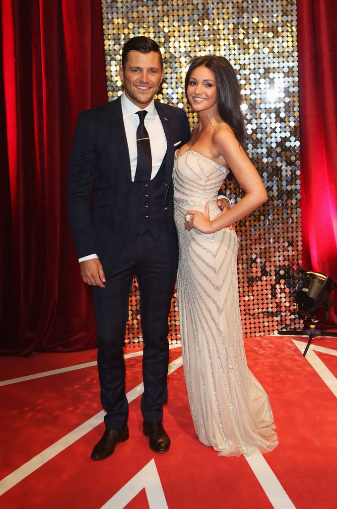 Michelle Keegan in a strapless sparkly dress with Mark Wright on the red carpet