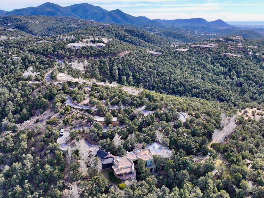 view of gene hackman santa fe home and surrounding mountains