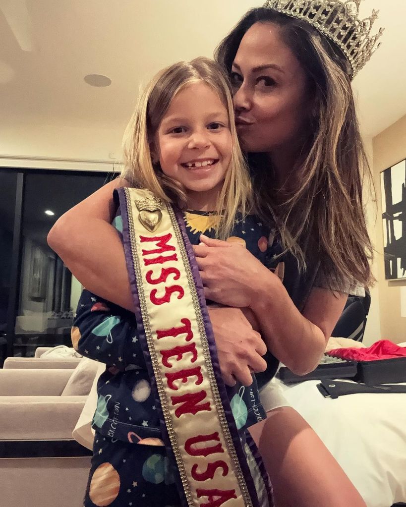 Vanessa Lachey and her daughter Brooklyn with her Miss Teen USA sash and crown