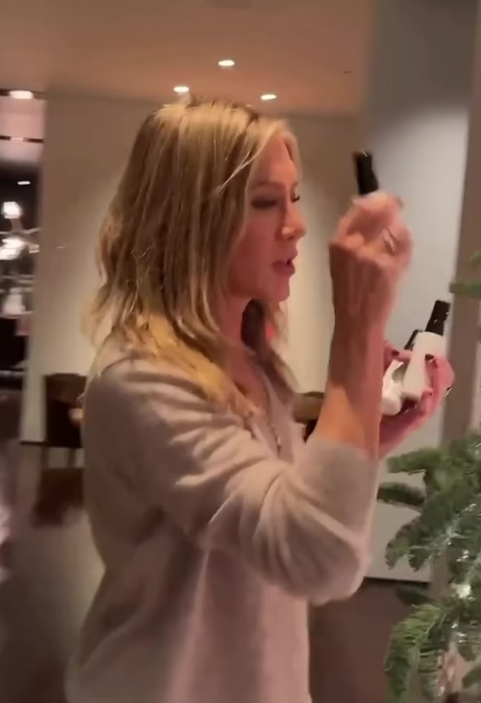 Jennifer decorates her tree with beauty products