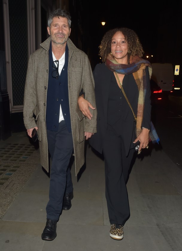 Angela Griffin walking at night to party with husband 