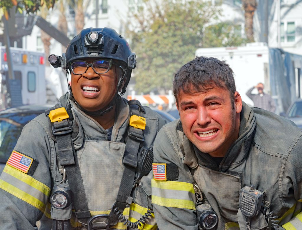 Aisha Hinds and Ryan Guzman as Hen and Eddie in 9-1-1