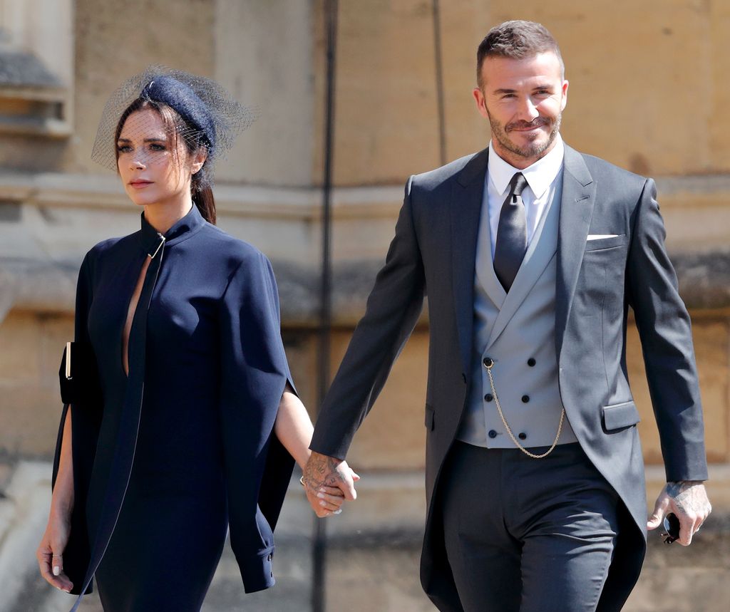 Victoria Beckham and David Beckham attend the wedding of Prince Harry to Ms Meghan Markle at St George's Chapel, Windsor Castle on May 19, 2018 in Windsor, England. 