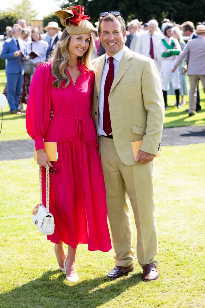 peter and girlfriend harriet posing for photos at goodwood 