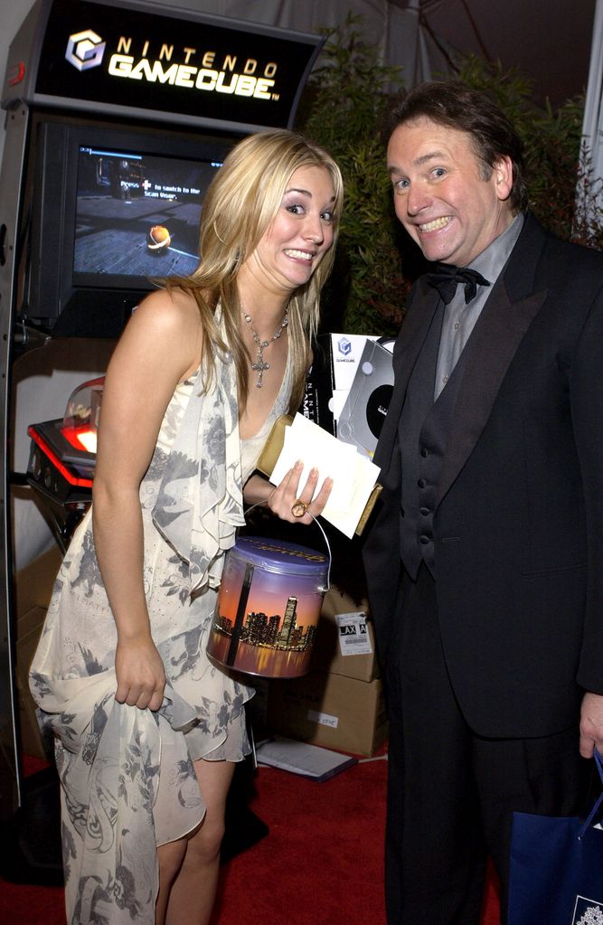 John Ritter and Kaley Cuoco visit the Nintendo booth at the 2003 People's Choice Awards