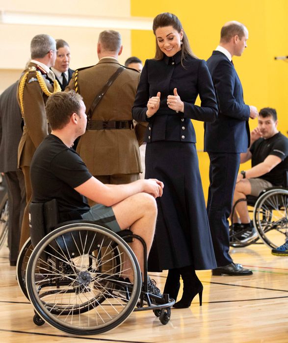 Kate Middleton giving a friendly thumbs up to a wheelchair sportsman
