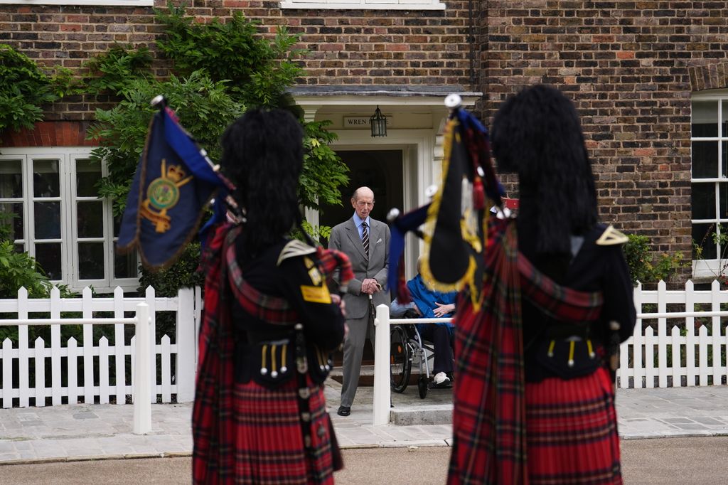 Duke of Kent watching pipers on birthday