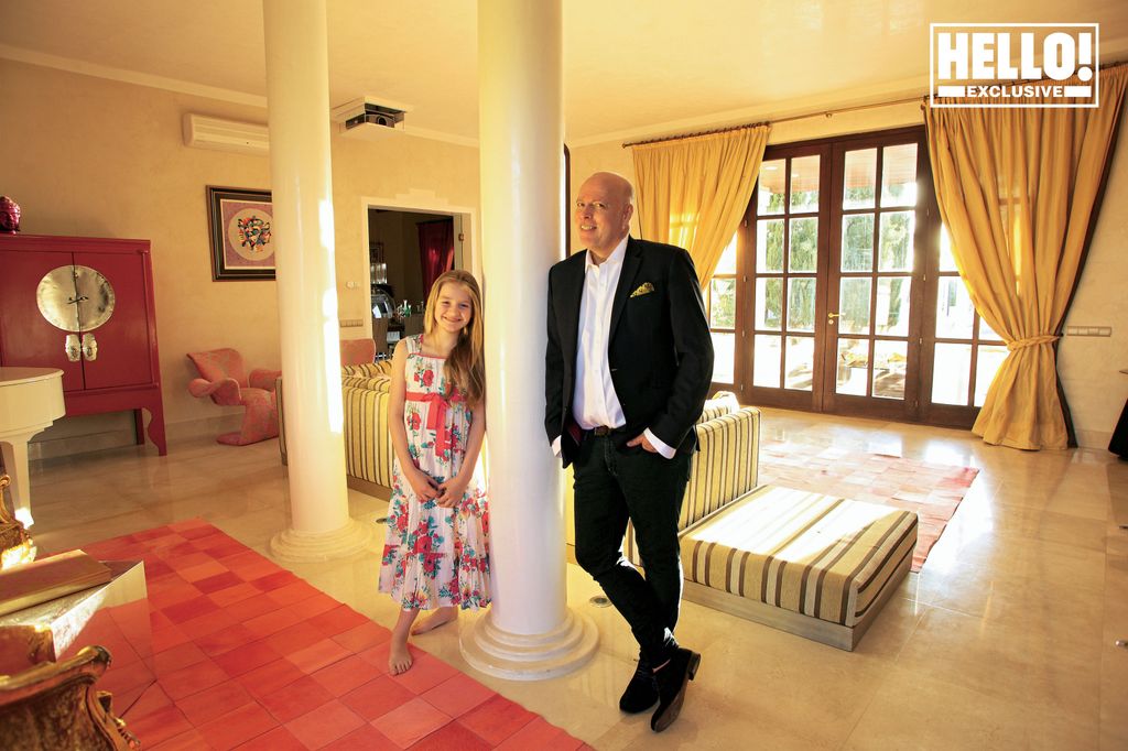 Kate Middleton's uncle Gary Goldsmith in black suit posing at home in Ibiza with daughter Tallulah 