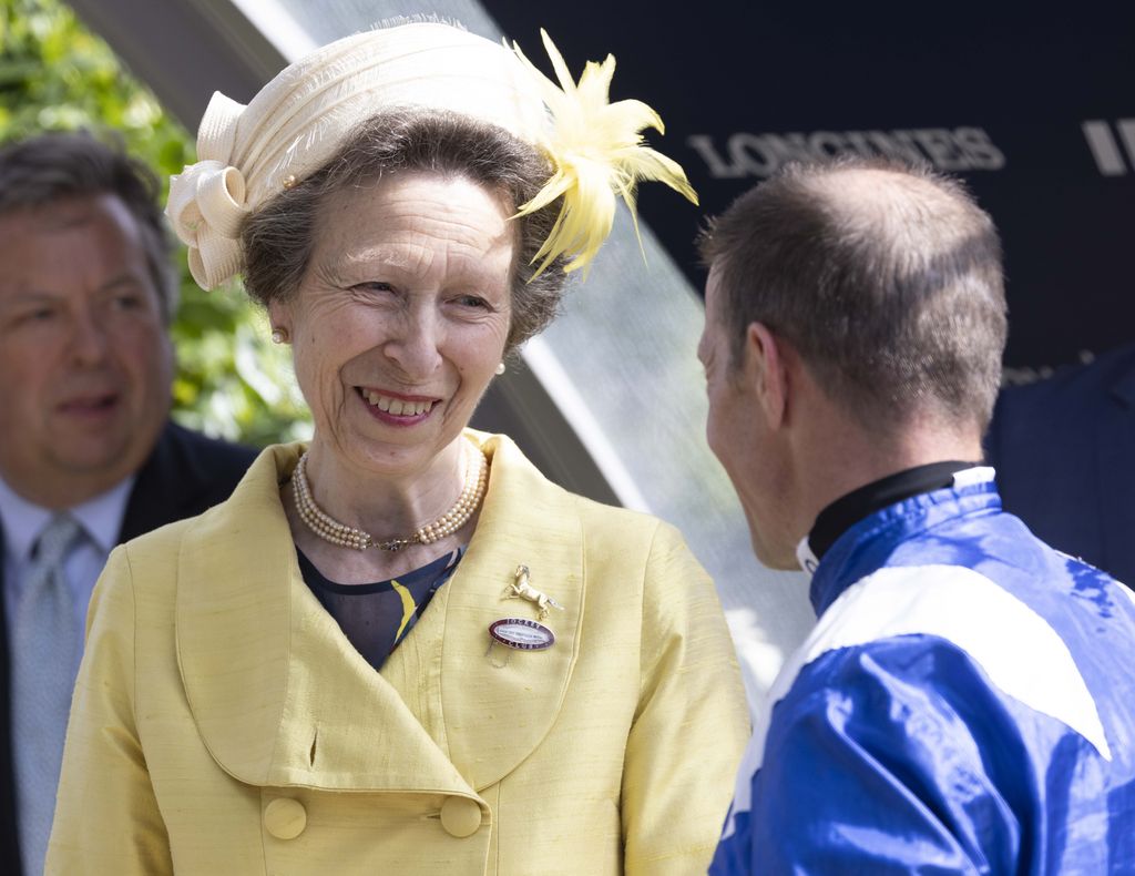 Princess Anne attends the QIPCO King George Day at Ascot and presents the King George VI and Queen Elizabeth II h Qipco Stakes trophy to the winning jockey Jim Crpwley