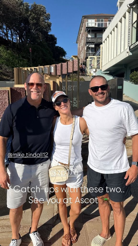 A photo of Zara Tindall wearing white shorts with her husband Mike and their friend 