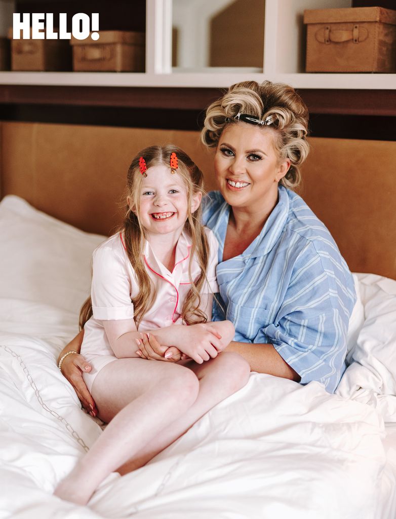 Louise Pentland with her hair in rollers in bed with Pearl