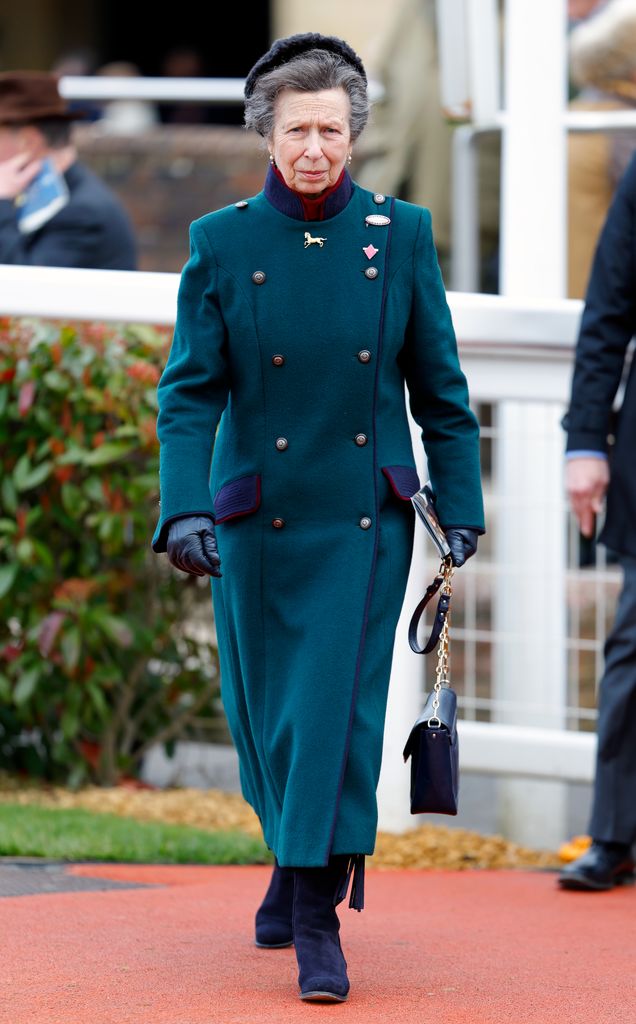 Princess Anne in long teal coat and boots