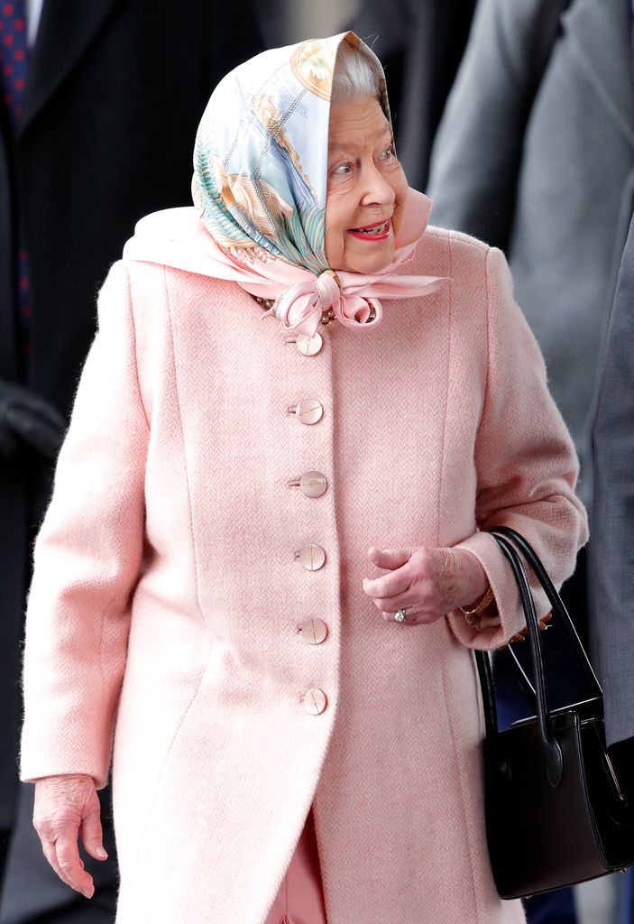 Queen Elizabeth in pink coat and a printed Hermes scarf