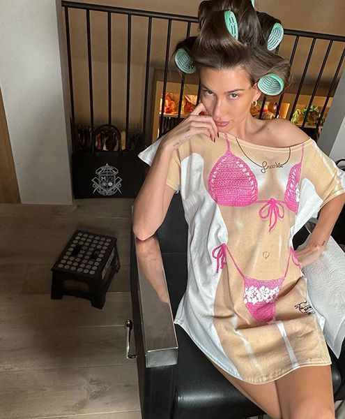 Hailey Bieber Poses With Her Hair In Rollers