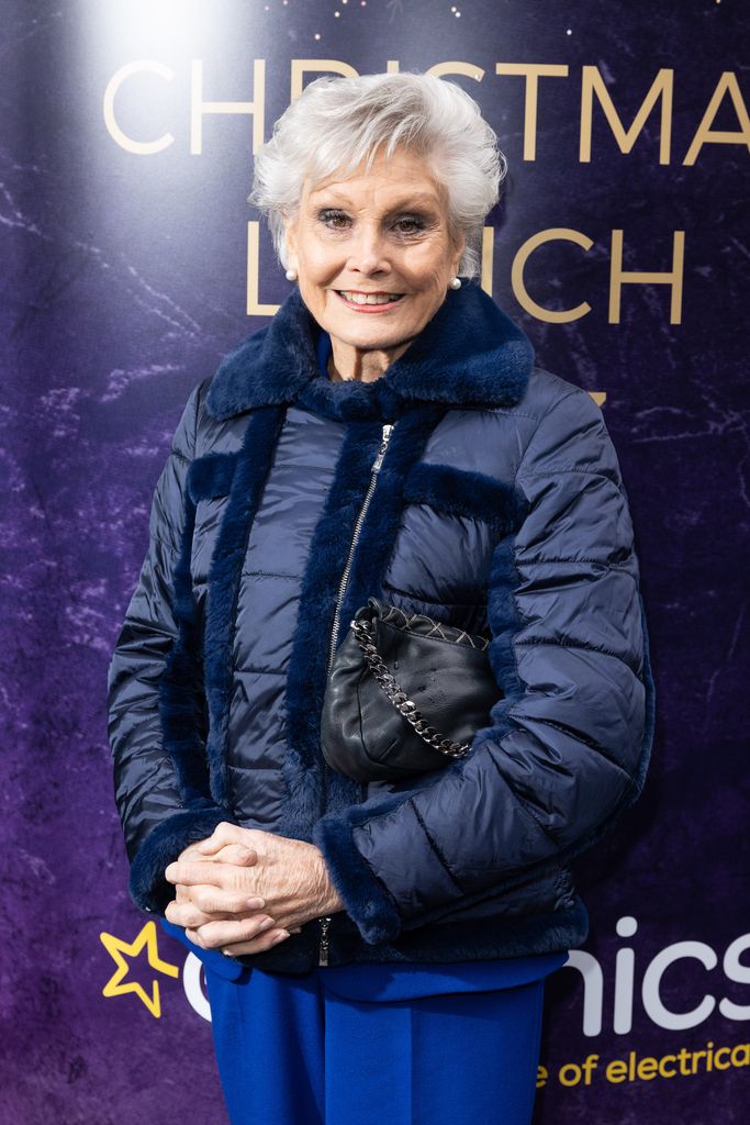 Angela Rippon in a blue coat