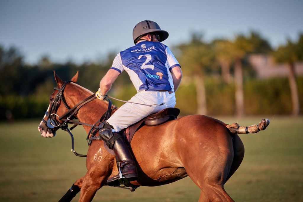 Prince Harry Co-Founding Patron of Sentebale, plays on the Royal Salute Sentebale Team, against the Grand Champions Team captained by his long-time friend and the charity's ambassador, Argentine polo player Nacho Figueras 