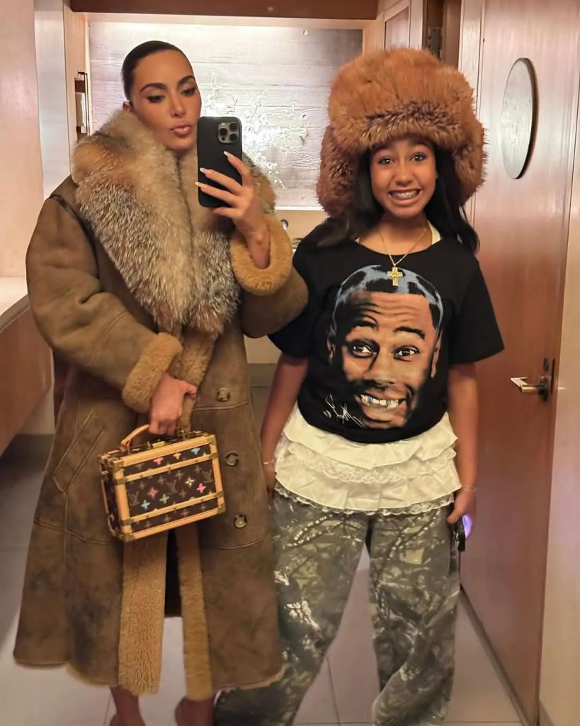 Kim and North twin in furs