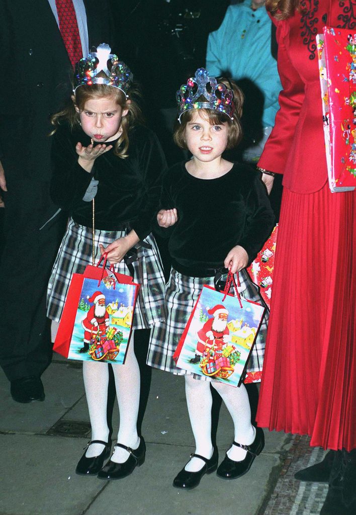  Princess Beatrice And Princess Eugenie in matching outfits and crowns in 1995