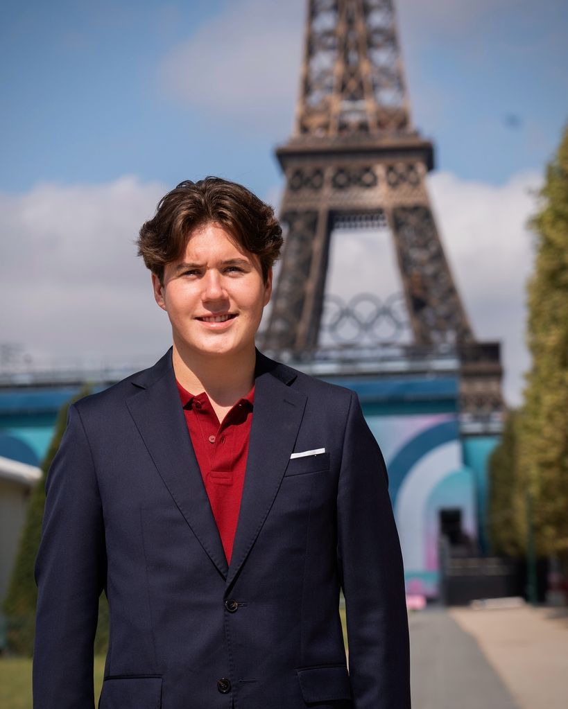 Crown Prince Christian standing in front of Eiffel Tower at Paris 2024 Paralympics