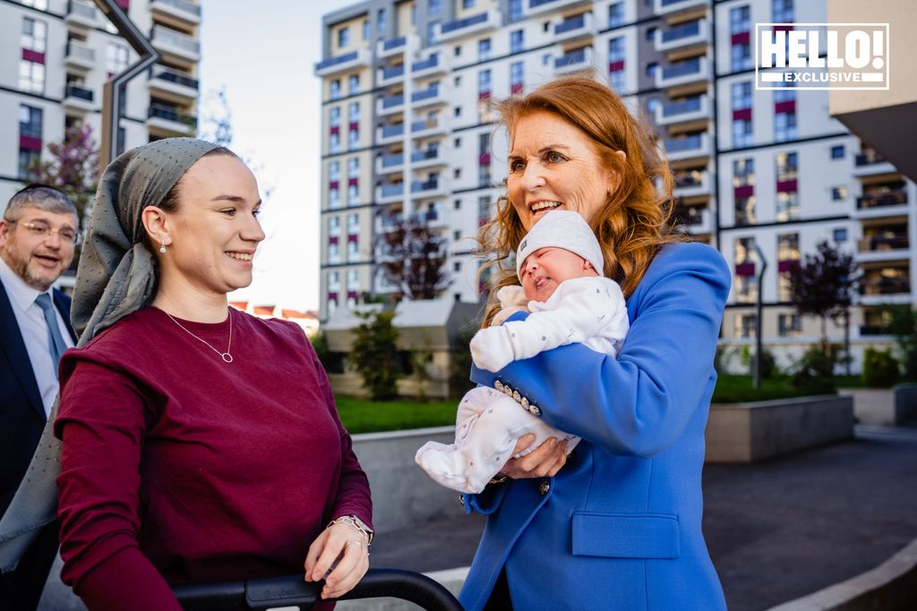 Sarah Duchess of York holding baby outside Tikva 