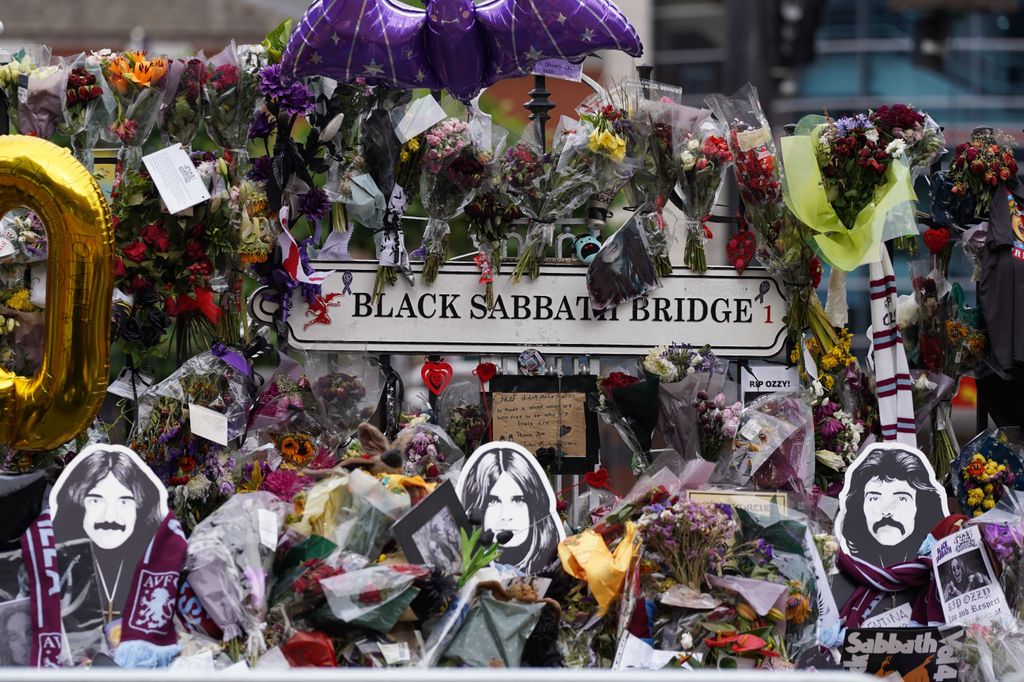 Flowers and notes are seen on the Black Sabbath Bridge in Birmingham