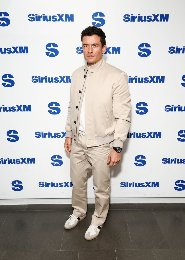 orlando bloom in cream outfit