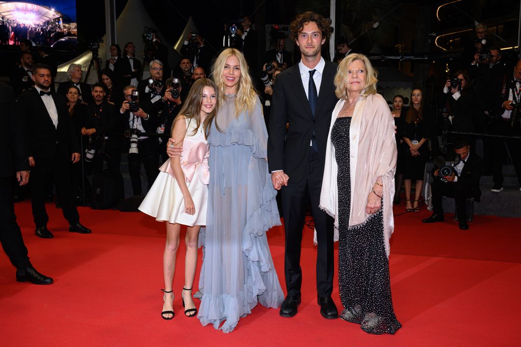 Sienna Miller on the red carpet with boyfriend Oli Green, mother Josephine and daughter Marlowe