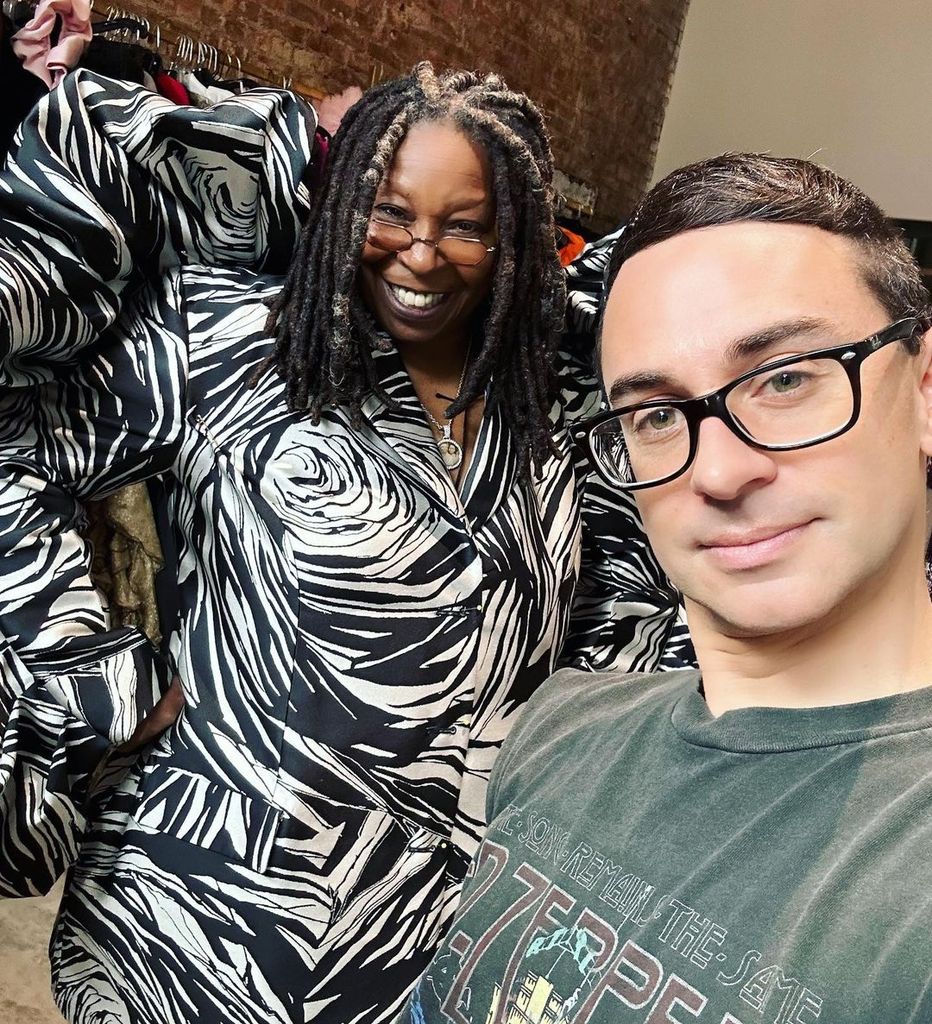 Whoopi and Christian behind the scenes smiling for a selfie