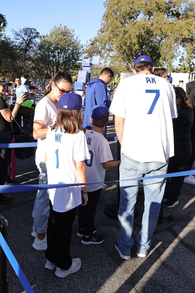 Ashton Kutcher and Mika Kunis arrive at the World Series at Dodgers Stadium in Los Angeles.