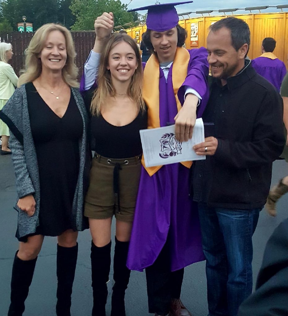 Photo shared on Instagram in 2018 of Sydney Sweeney with her mom Lisa, dad Steven and her brother Trent at Trent's graduation