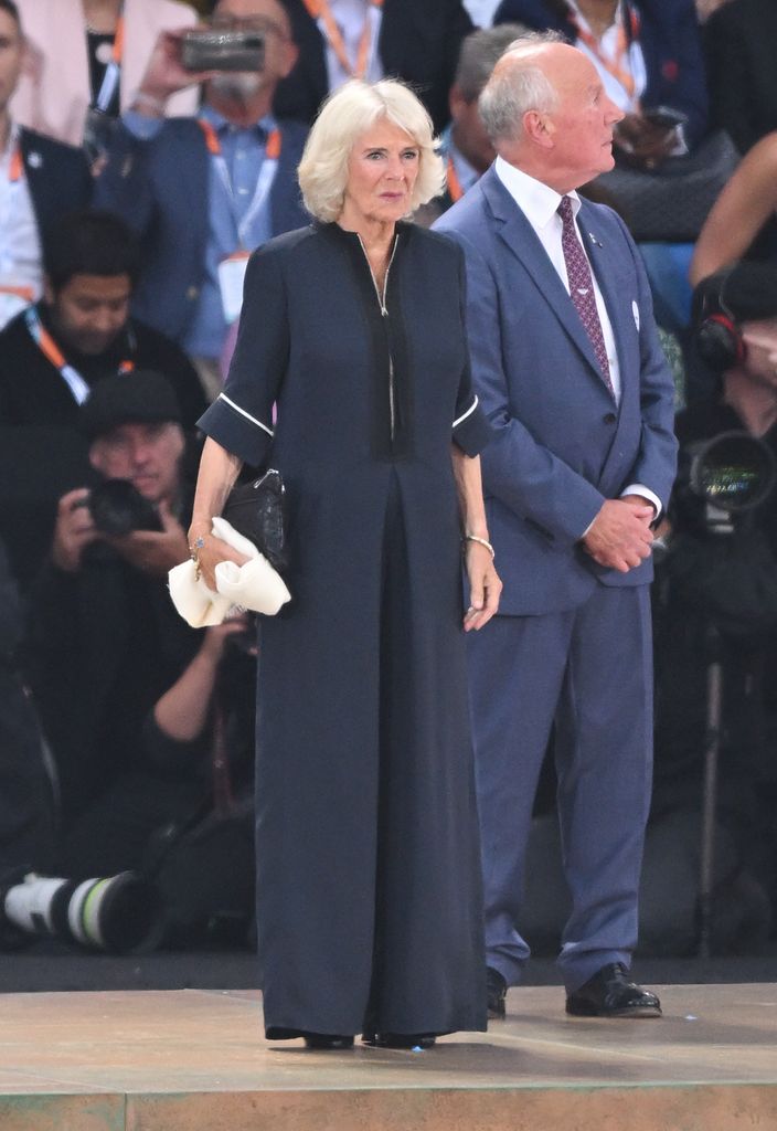 Camilla wearing a navy blue jumpsuit to the 2022 Commonwealth Games opening ceremony in Birmingham