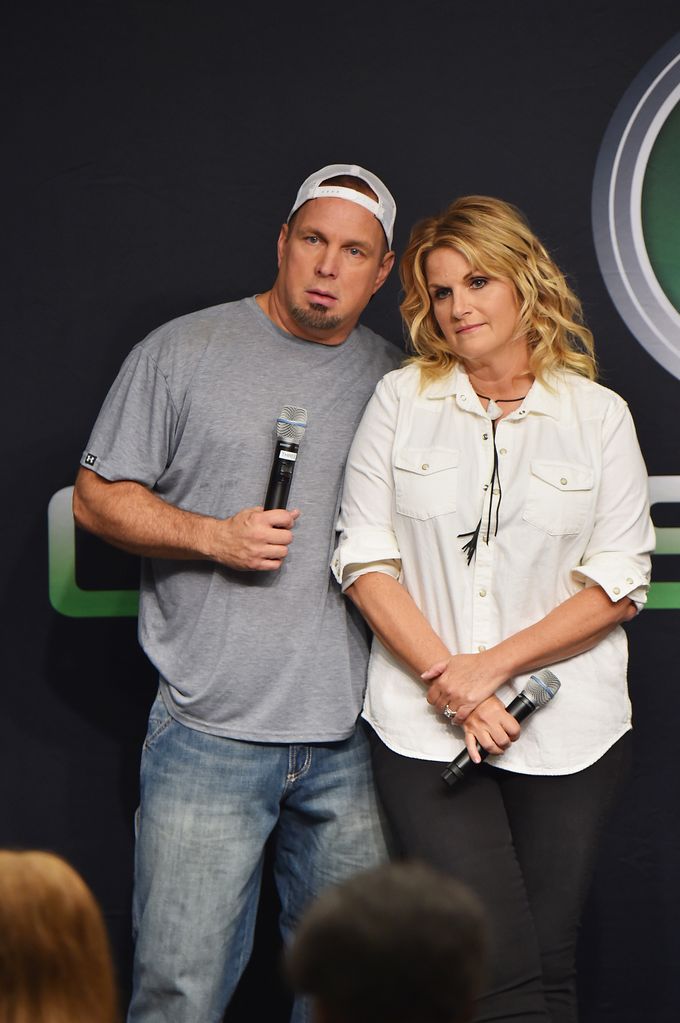Garth Brooks and Trisha Yearwood take part in a press conference at Yankee Stadium on July 8, 2016 