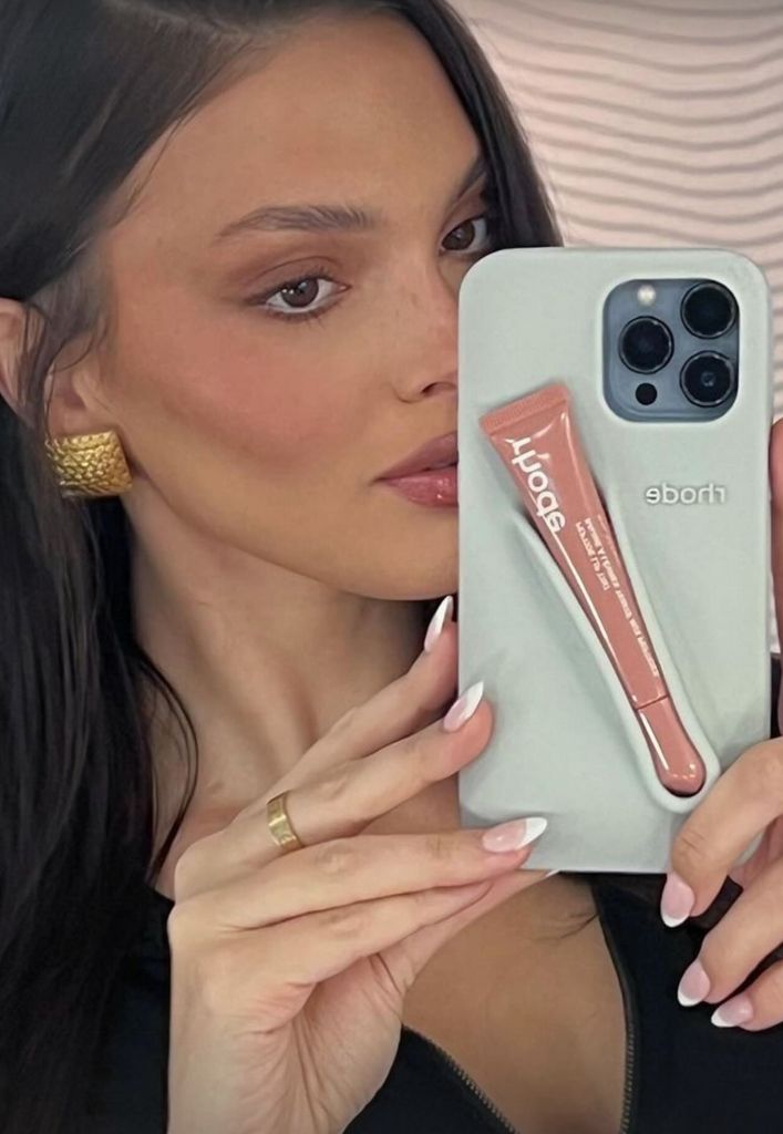 Kendall Jenner taking a selfie with her Rhode Lip Case