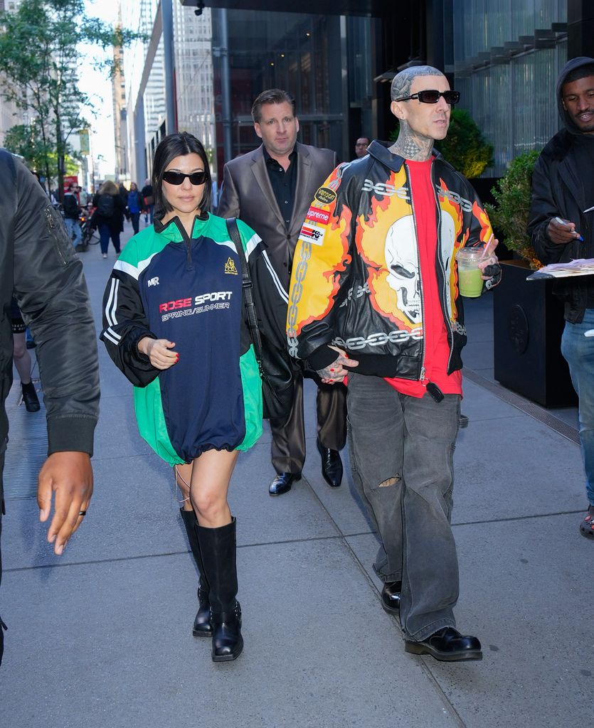 Kourtney Kardashian and Travis Barker holing hands on the streets of New York 