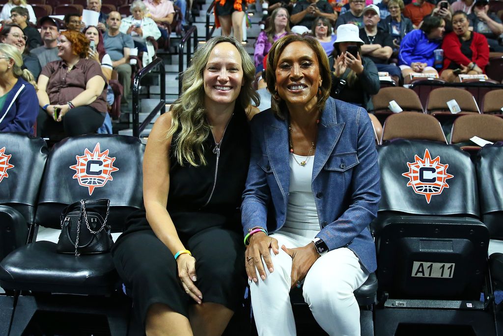 Good Morning America co-anchor Robin Roberts and fiancÃ©e Amber Laign pose for pictures during a WNBA game between Phoenix Mercury and Connecticut Sun on August 31, 2023, at Mohegan Sun Arena in Uncasville, CT.