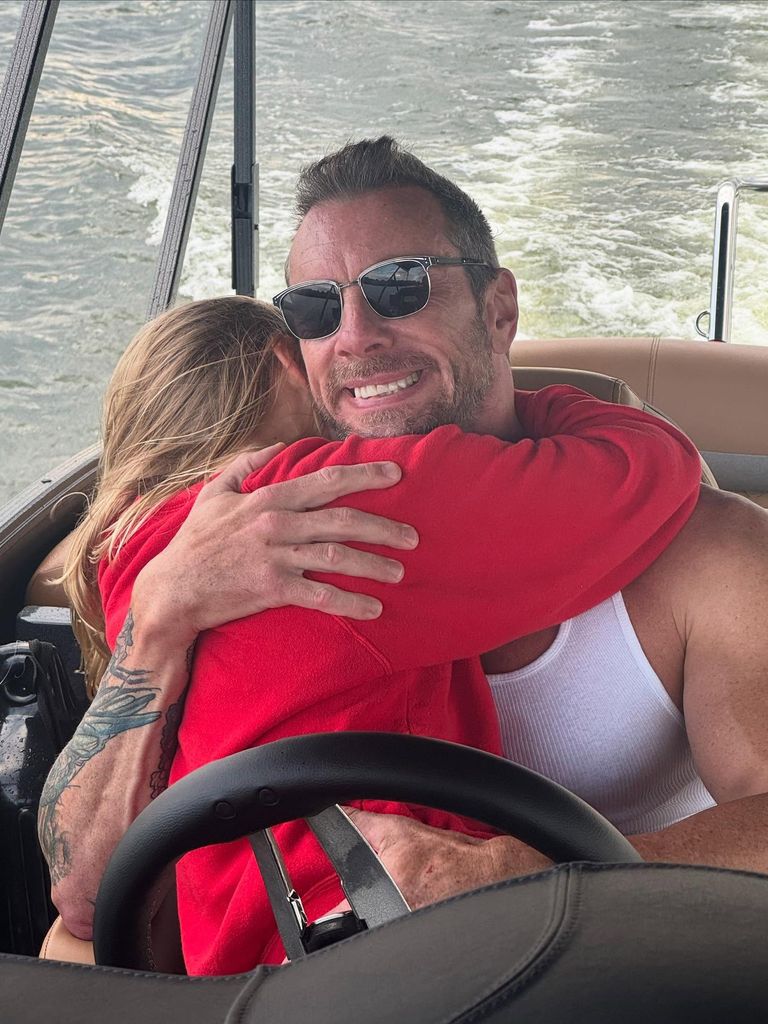 photo of dax shepard hugging daughter