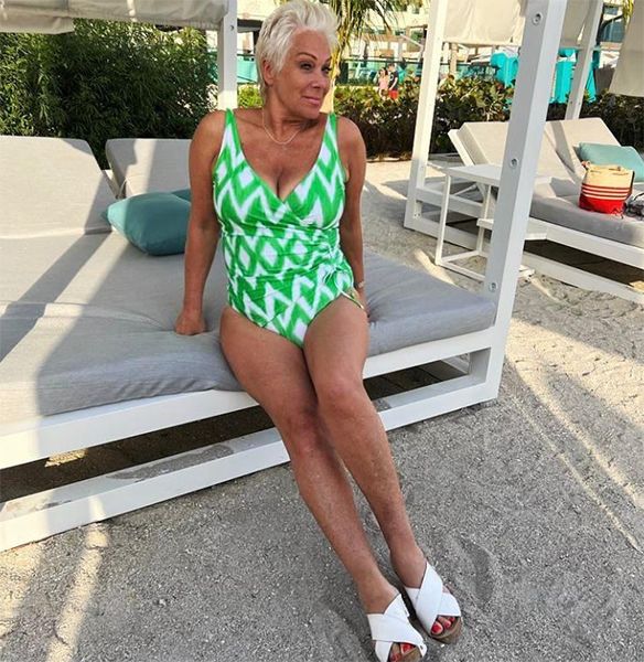 Denise Welch in a green swimsuit