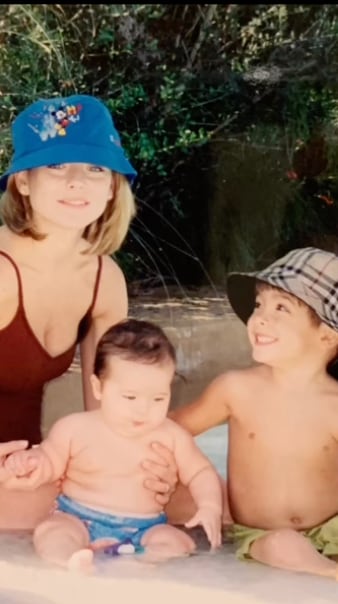 Kelly Ripa looked stylish in a tiny red swimsuit in a throwback photo