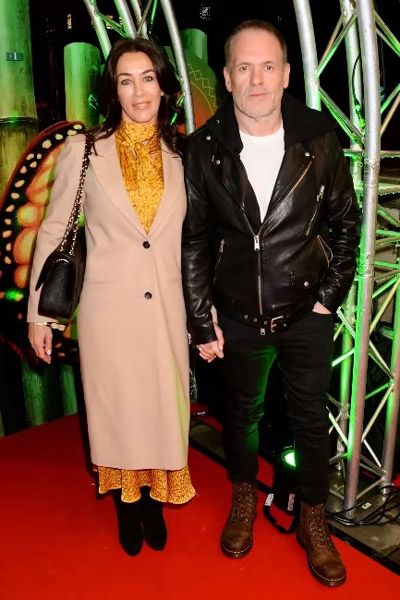 Chris Moyles posing with girlfriend Tiffany on the red carpet