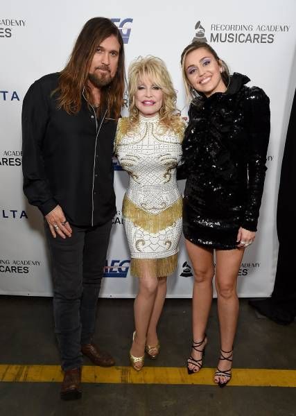Miley Cyrus with Dolly Parton and Billy Ray Cyrus
