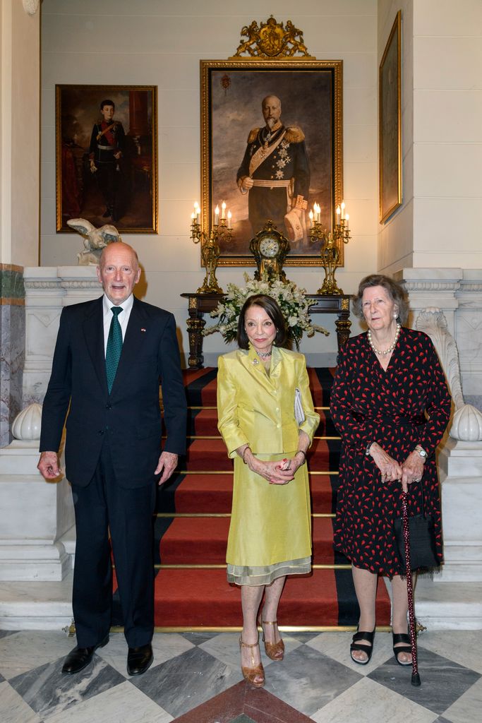 King Simeon, Queen Margarita and Princess Marie-Louise inside a palace