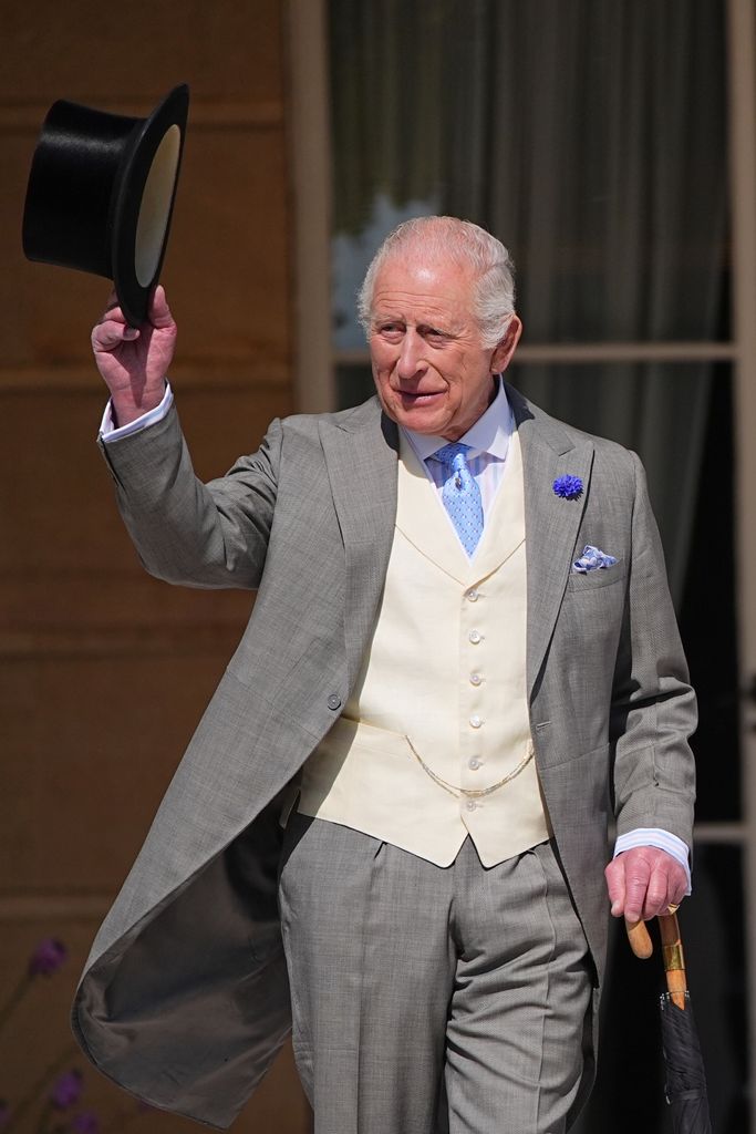 King Charles tilts his top hat