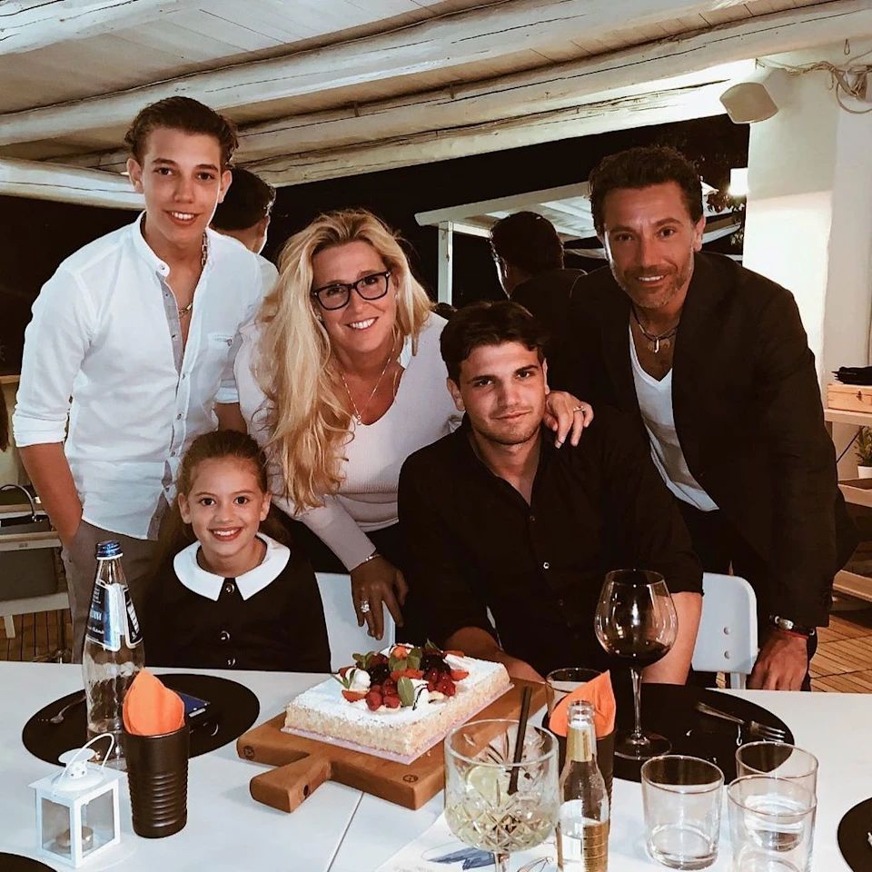 Gino with his two sons and daughter Mia and wife at restaurant