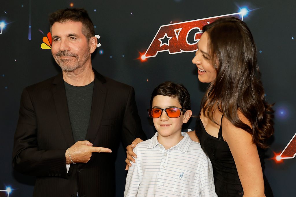 Simon Cowell with son Eric and partner Lauren Silverman on red carpet for America's Got Talen
