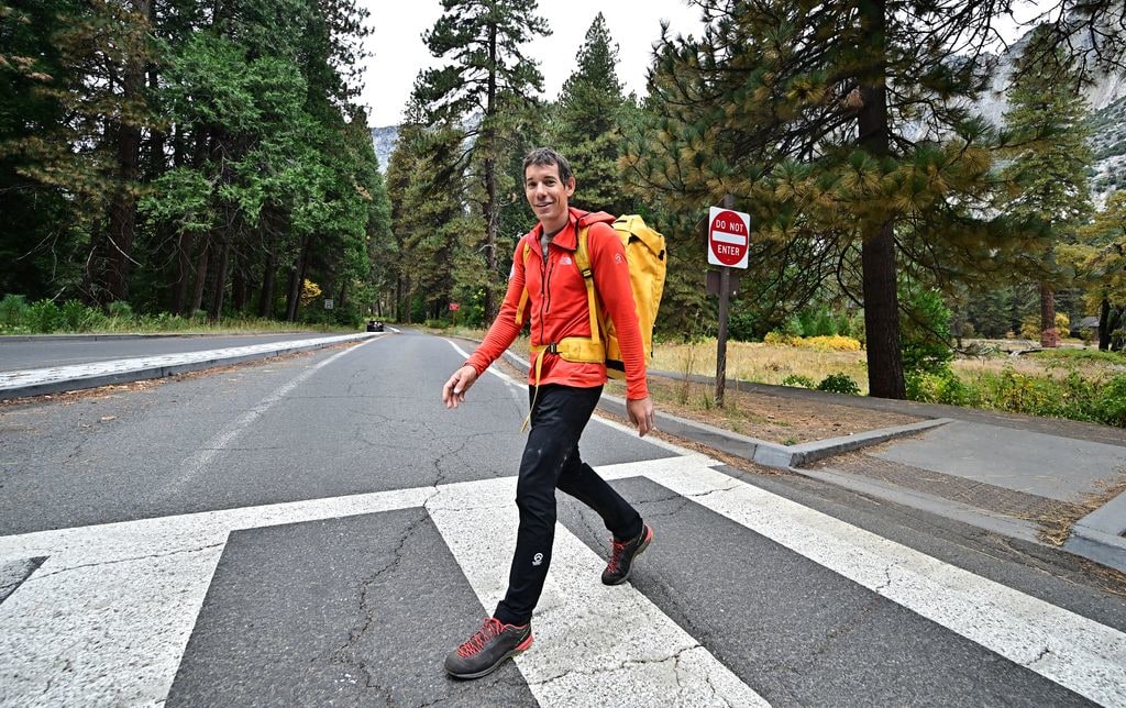 US rock climber Alex Honnold, famed for his free solo ascents of El Capitan, walks at Yosemite National Park, California on October 26, 2025, amid the ongoing US government shutdown. Thousands of adrenaline junkies including BASE jumpers are flocking to California's Yosemite National Park, as the US government shutdown leaves park rangers short-staffed to cope at the world-renowned climbing destination.
The shutdown, which began on October 1 due to the budget impasse between Republicans and Democrats in Congress, has seen personnel levels plummet at this national park -- which is home to the imposing 3,000-foot granite wall known as El Capitan.
"We're challenged," a park ranger told AFP, on condition of anonymity.
"A lot of rangers have been furloughed" and those still working have had to contend with "an increase in illegal activity," he said.