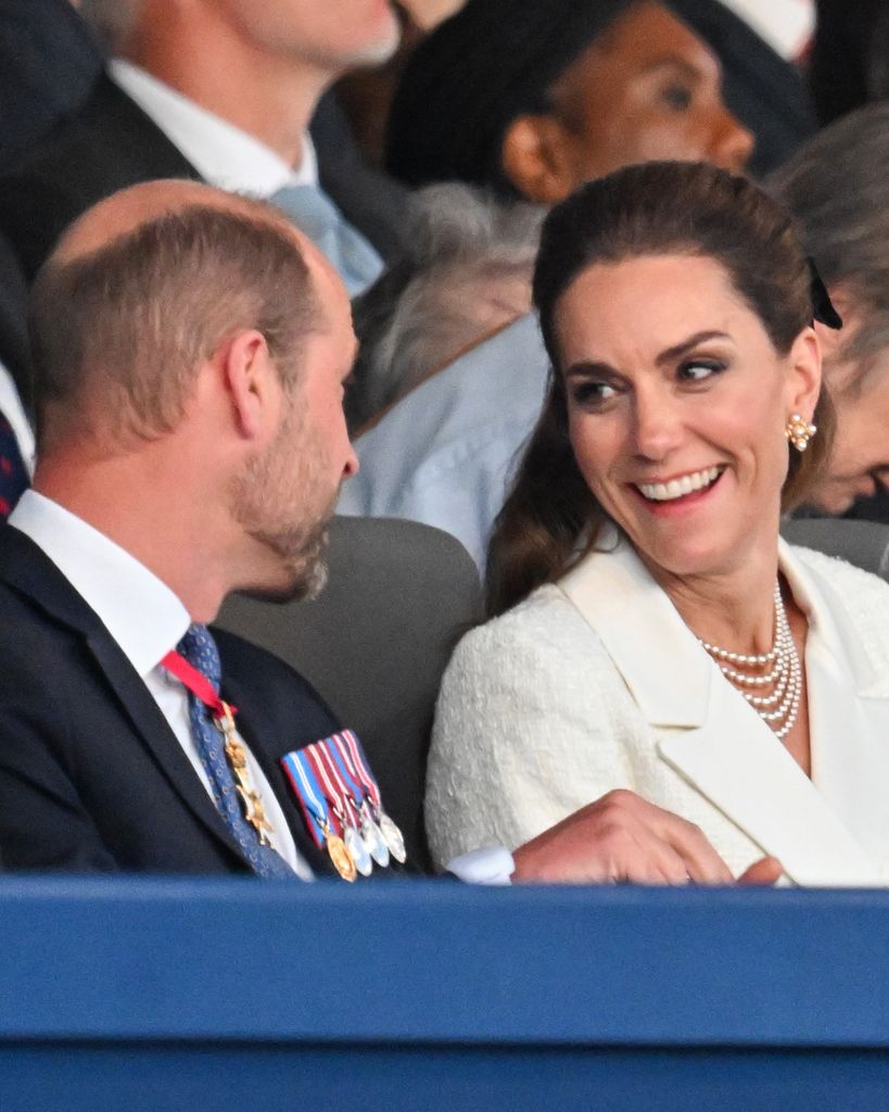 William and Kate smiling at VE Day concert