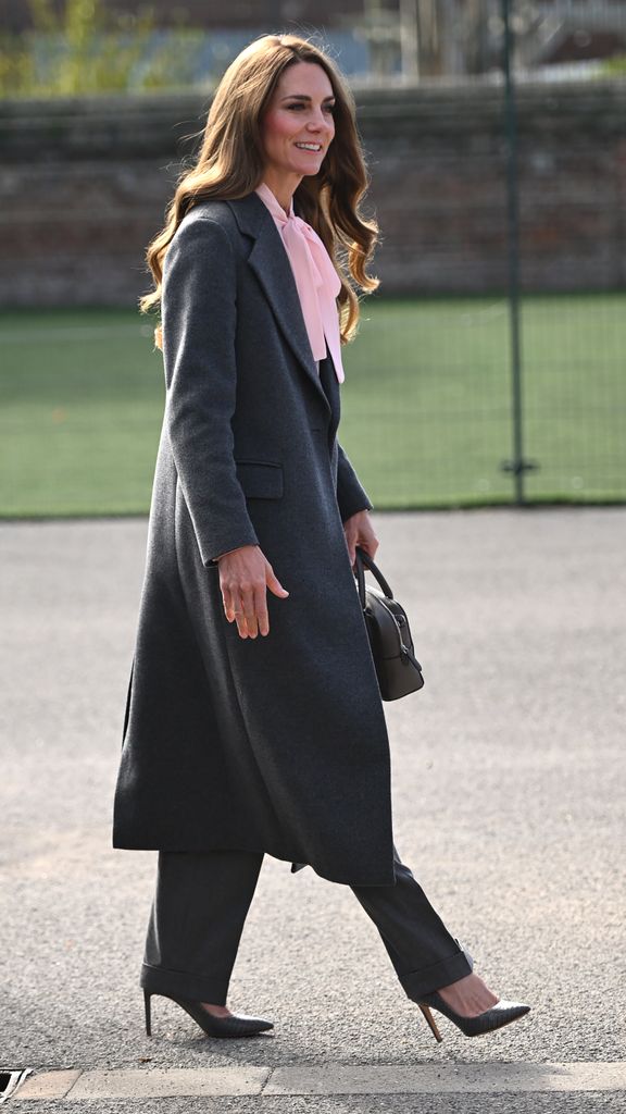 Kate Middleton arriving in Southport in grey coat and pink blouse