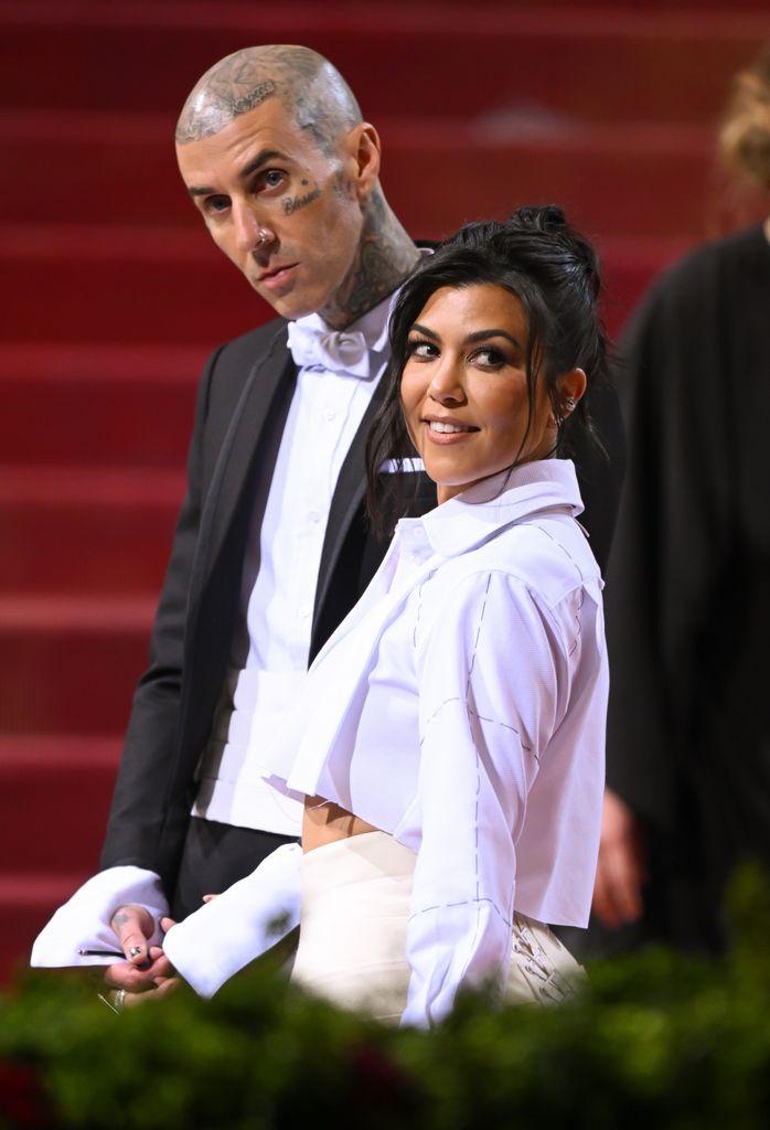 Travis Barker and Kourtney Kardashian arrive to the 2022 Met Gala Celebrating "In America: An Anthology of Fashion" at Metropolitan Museum of Art on May 02, 2022 in New York City