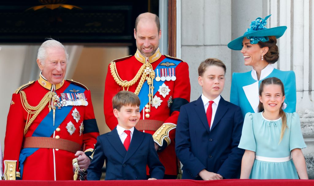 King Charles and Prince Louis watch an RAF flypast from the balcony of Buckingham Palace